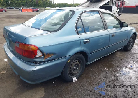 2000 Honda Civic Lx z USA, uszkodzony, nr VIN 1HGEJ6678YL057178